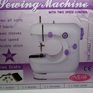 Electric Sewing Machine dual speed, automatic thread rewind, double stitch.